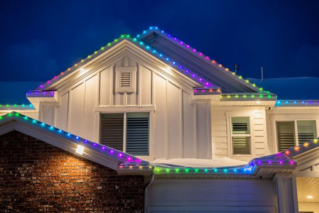 Close view of colorful EverLights installed along multiple roof peaks
